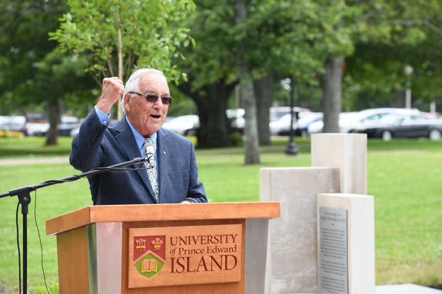 A man stands at a podium 