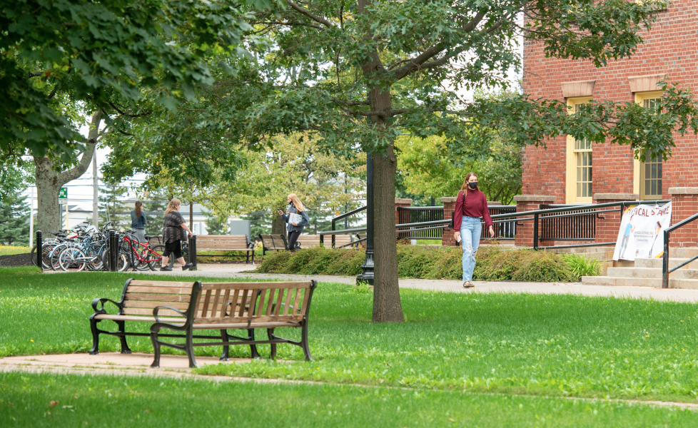 photo of student walking with mask