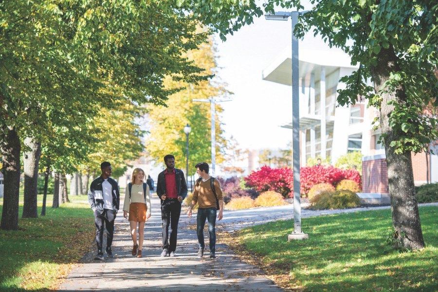 Students walking on UPEI campus near AVC