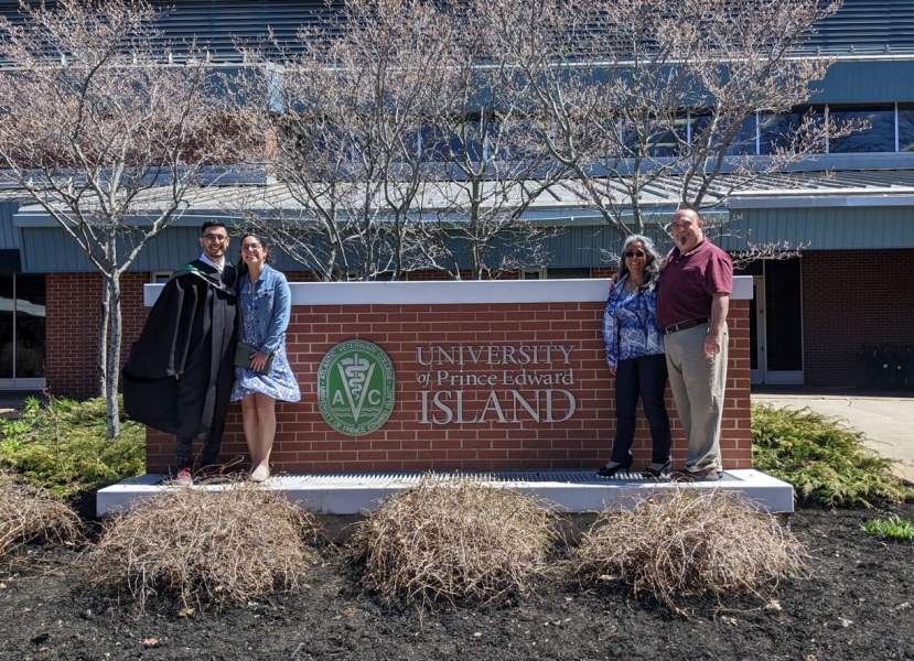 Dr. Andrew Cohen poses with his family outside of the Atlantic Veterinary College after the UPEI Convocation Ceremony. 