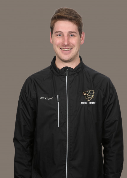 portrait photo of man smiling wearing black jacket