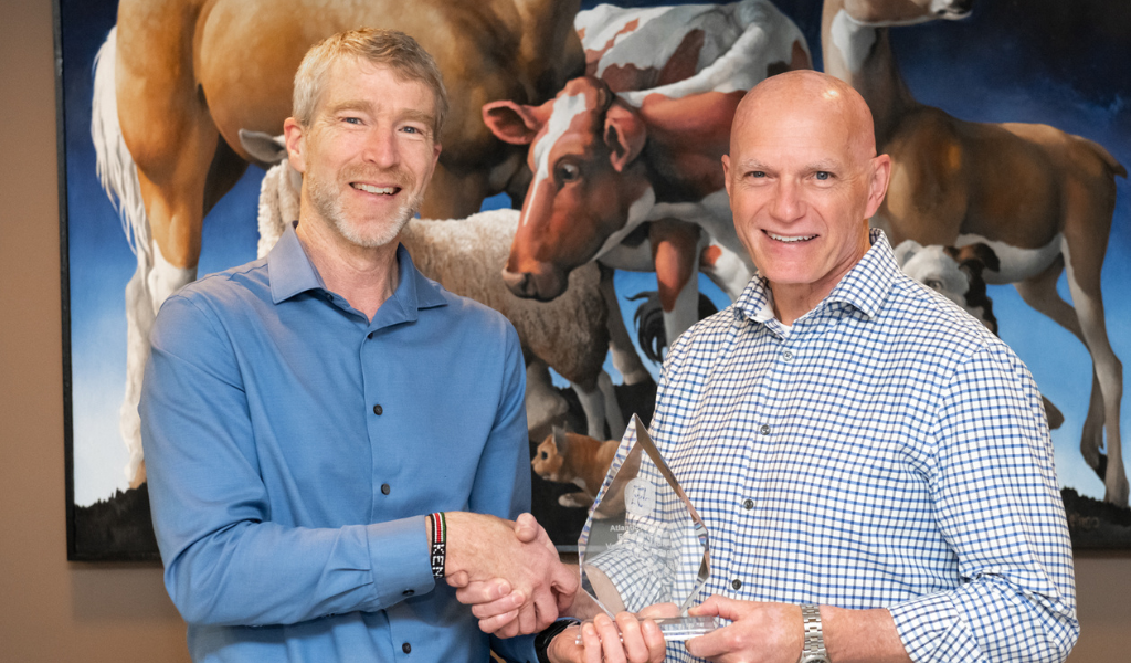 Dr. Larry Hammell, professor of health management, Atlantic Veterinary College, accepts the AVC Atlantic Award of Excellence in Veterinary Medicine and Animal Care Award from Dr. John VanLeeuwen, interim dean, AVC.