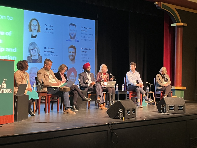 Panelists holding discussion
