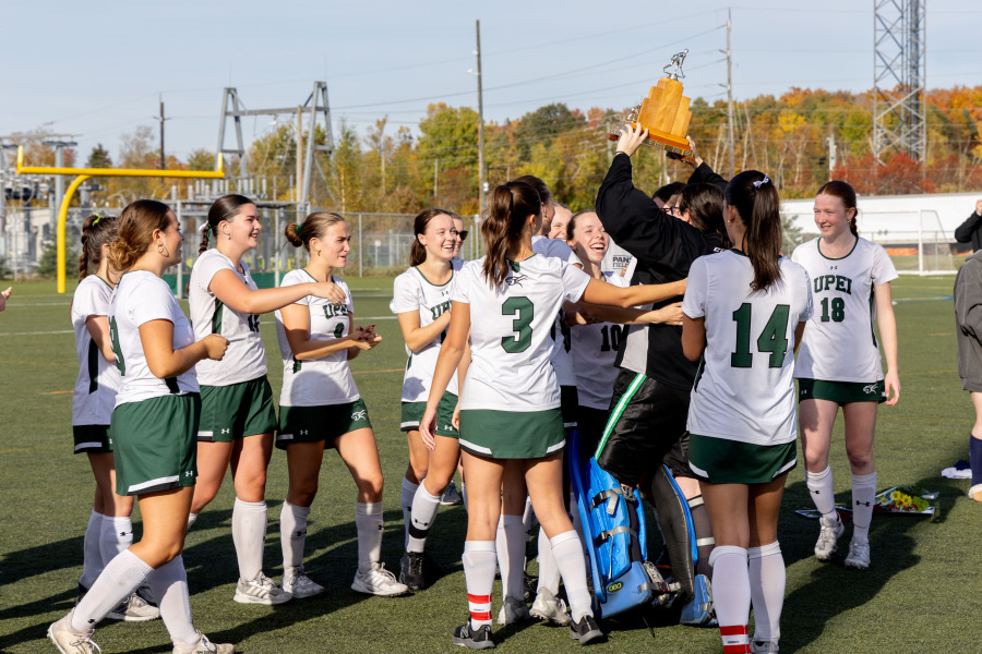 The UPEI Women’s Field Hockey Panthers celebrate as they capture their third straight Atlantic University Field Hockey championship on October 20, 2024. Photo credit: Janessa Vanden Broek. UPEI Women's Field Hockey Panthers