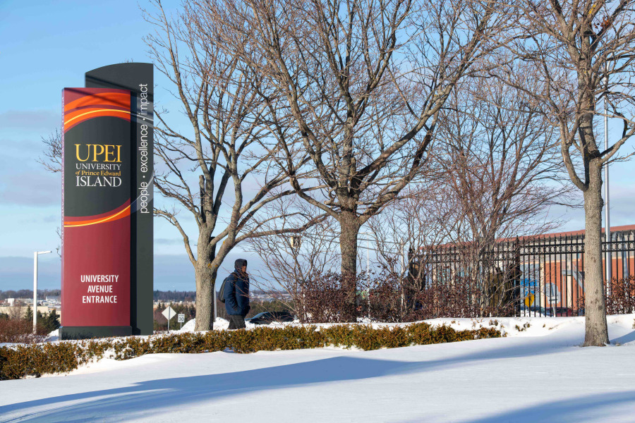 photo of campus entrance sign during winter
