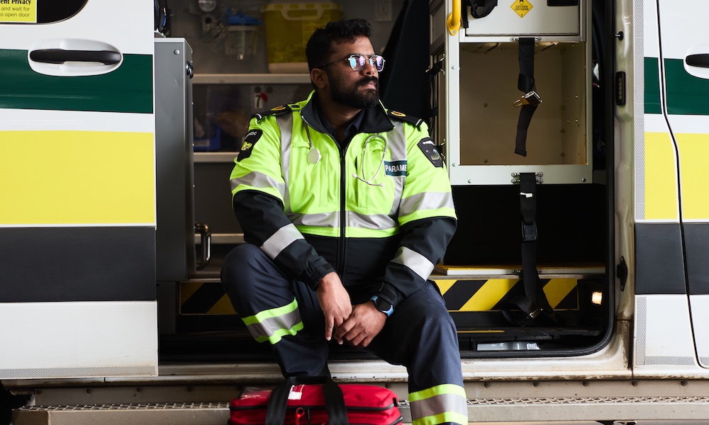 UPEI paramedicine student Bibin Peter in an ambulance