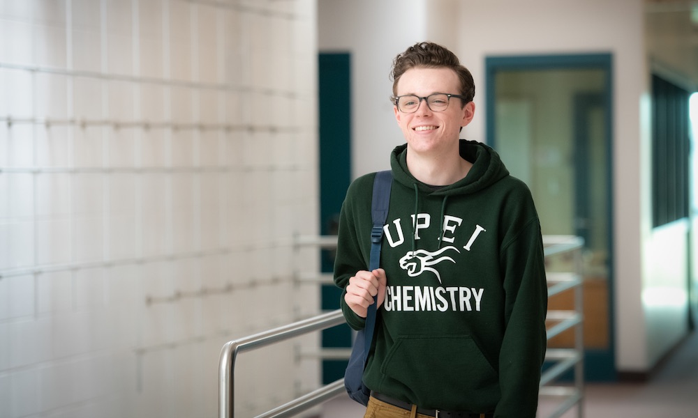 a UPEI chemistry student in a lab