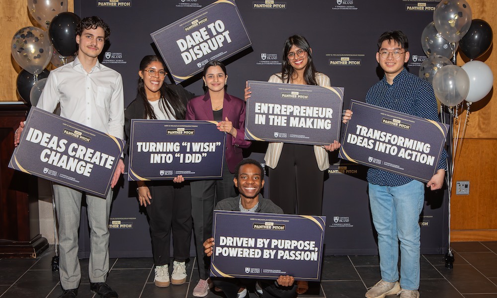 a group of seven students at an entrepreneurship event