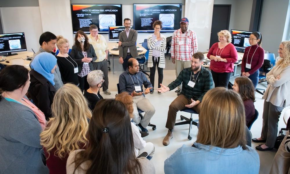 a group of faculty members in session at the UPEI Faculty Development Summer Institute