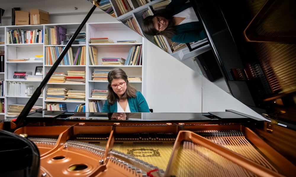 Dr. Magdalena von Eccher playing piano in Steel Recital Hall at UPEI