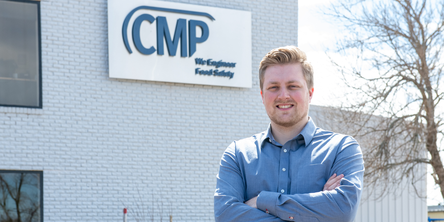 upei engineering graduate and professional engineer peter doiron standing in front of charlottetown metal products main office