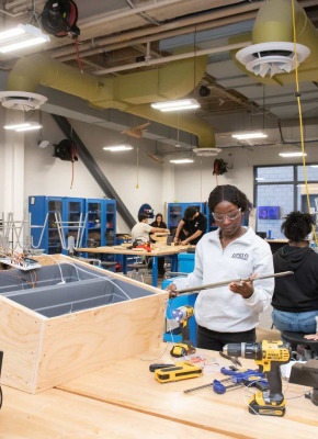 UPEI engineering student Rosetta Shokunbi working on a project in a lab
