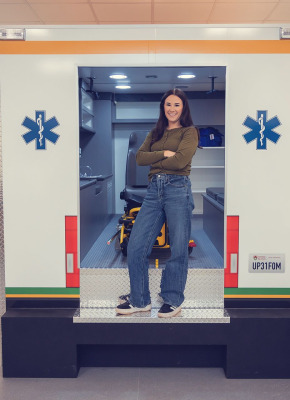 UPEI Paramedicine graduate Kellie MacLeod in a mock ambulance