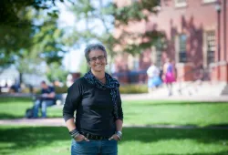 photo of professor Ann Braithwaite in UPEI's quadrangle on a summer day