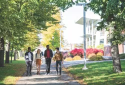 Students walking on UPEI campus near AVC