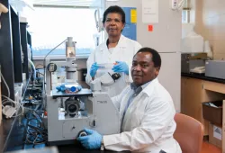 Drs. Fred Kibenge and Molly Kibenge pictured in an AVC lab. 