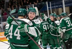 In front of a sell-out crowd at the Eastlink Centre, the UPEI Panthers celebrate after they upset the nation's top-ranked team, the University of Calgary Dinos, 4-2 to advance to the U CUP semifinals.