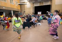 Indigenous dancers in regalia