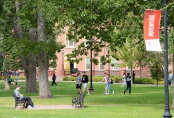 photo of quadrangle with welcome banner in the foreground