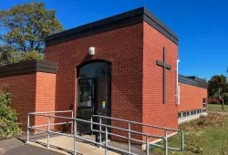 photo of the entrance to a brick building on campus