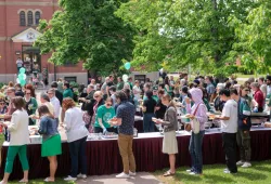 photo of a large group of people at a barbecue