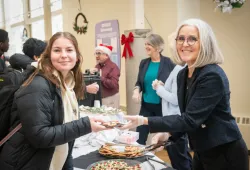 UPEI President and Vice-Chancellor Wendy Rodgers serves refreshments to students during the Cookie and Coffee Break on December 9.