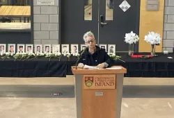 Dr. Ann Braithwaite, professor of Diversity and Social Justice Studies at UPEI speaking at the 2023 candlelight vigil.