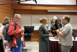 Megan Follows speaks to a fan at the L.M. Montgomery conference