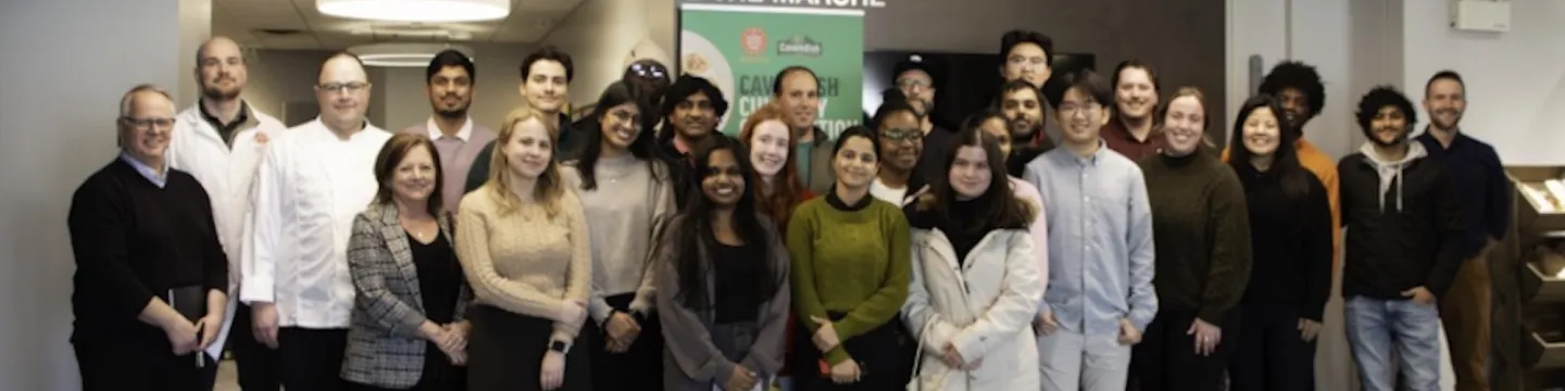 a photo of a group in a meal hall