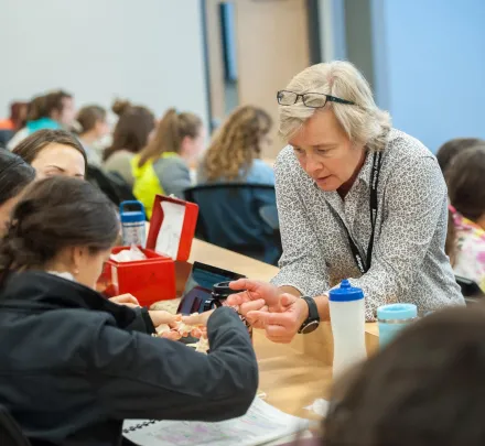 a professor helping a student 