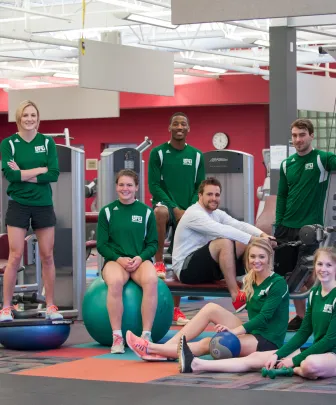 athletes stand in the gym