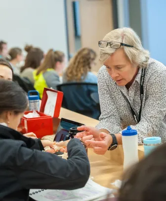 a professor helping a student 