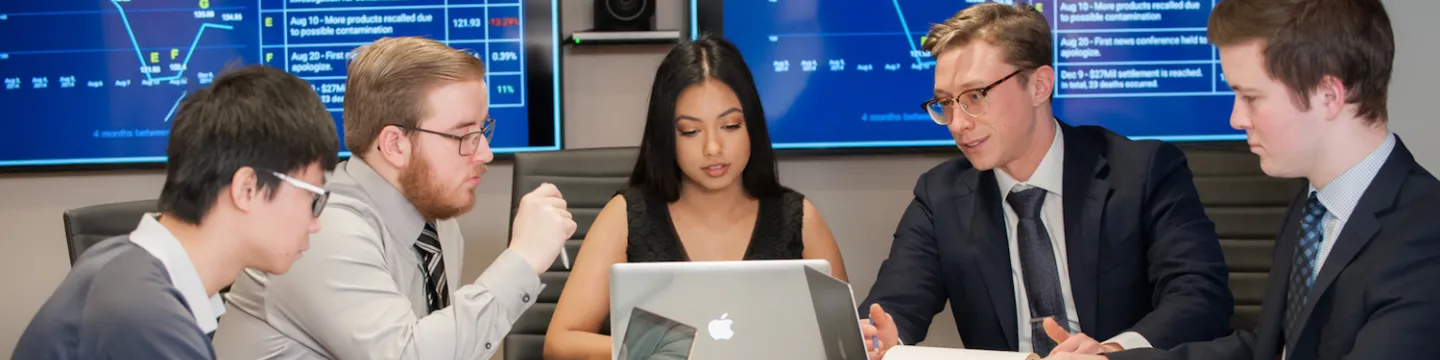 students meeting in a boardroom 