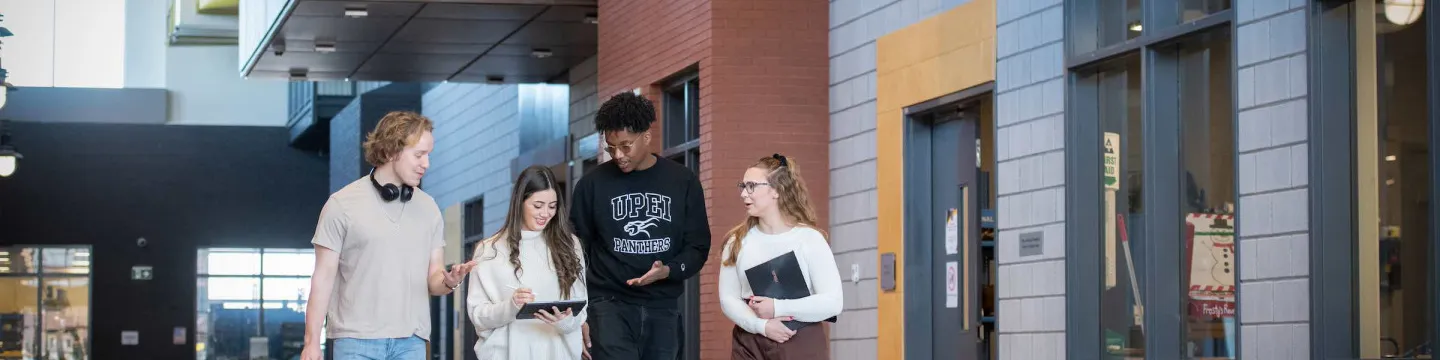 four engineering students in the Faculty of Sustainable Design Engineering building