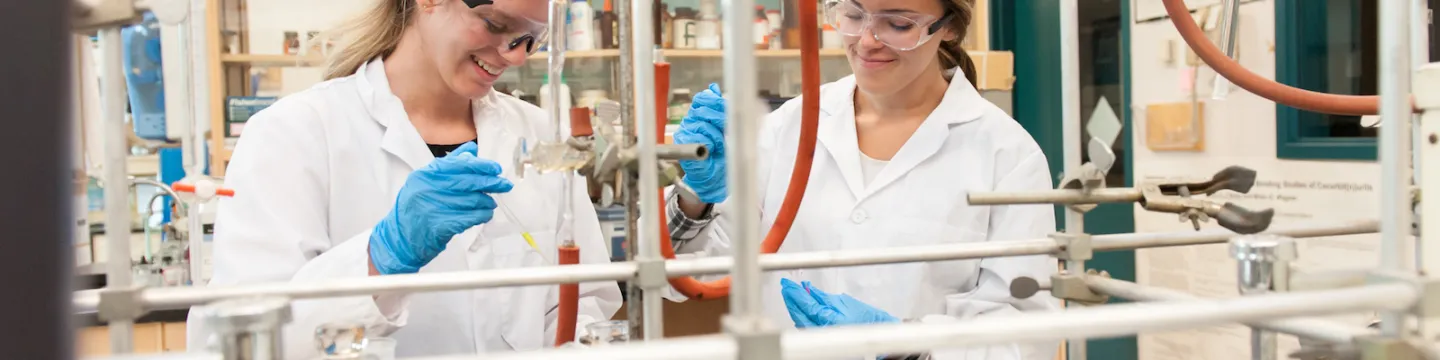 two Master of Science program students in the chemistry lab