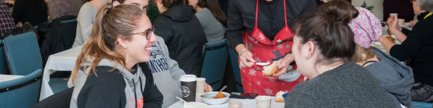 Registrar Donna Sutton serves students at Rocky's Chilli Lunch