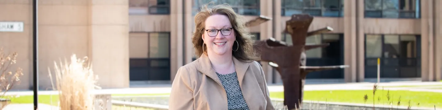 lisa holland standing in front of PEI's government offices 