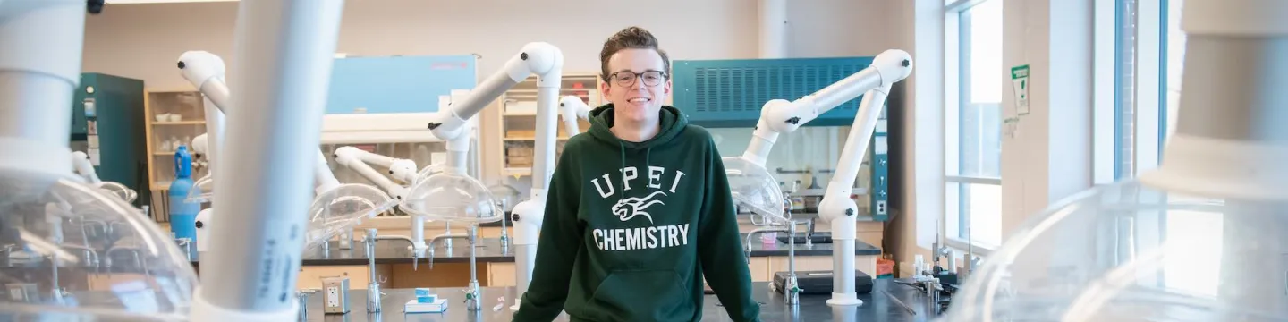 a UPEI chemistry student in a lab