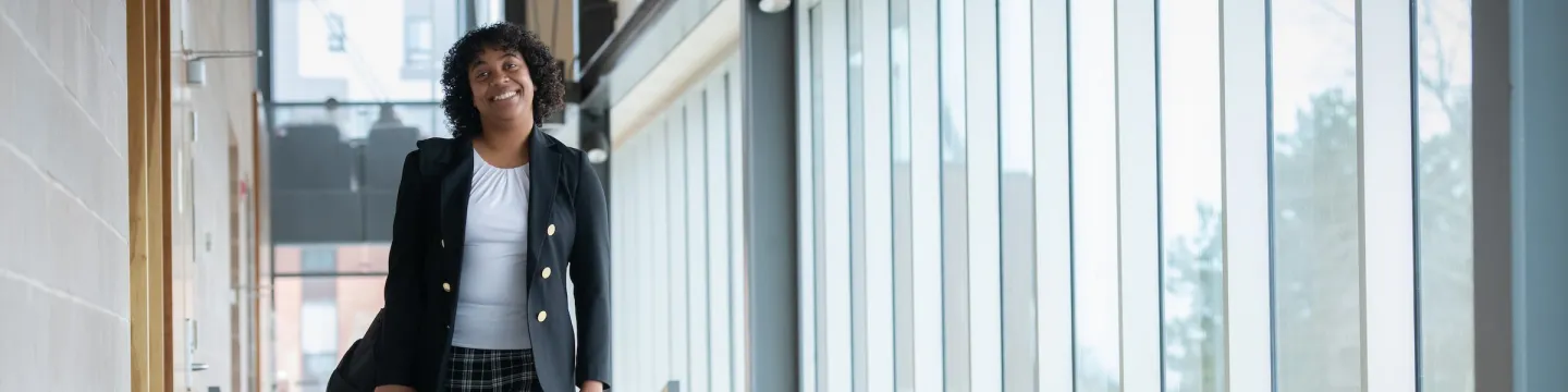 UPEI MBA in global leadership student Nathalie in the Faculty of Business building