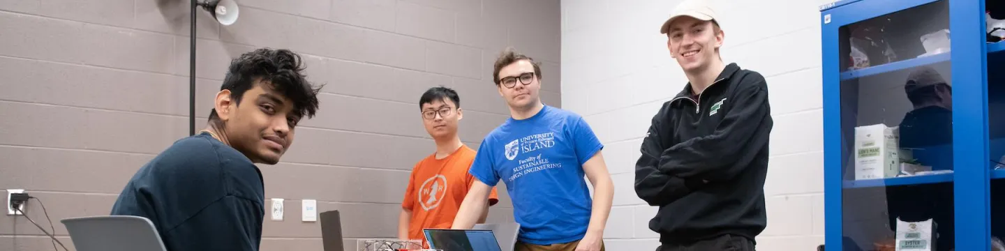 four engineering students and their fourth-year project