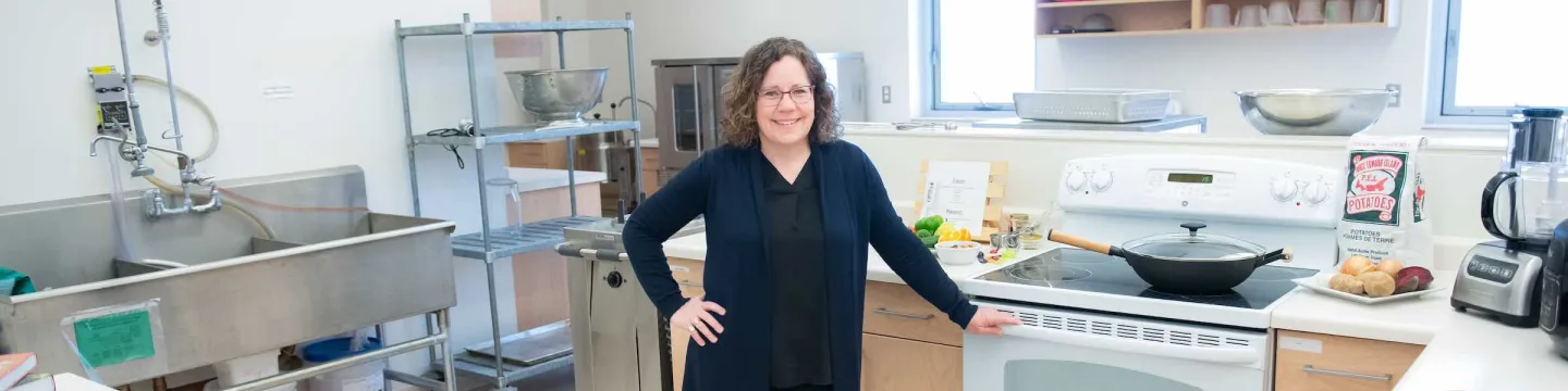 a dietitian in a commercial kitchen