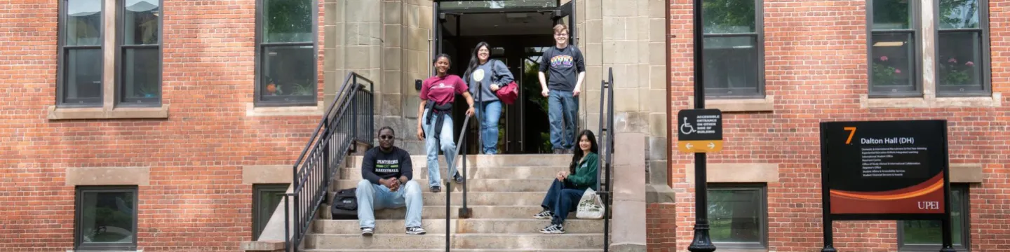 students standing on the steps of Dalton Hall
