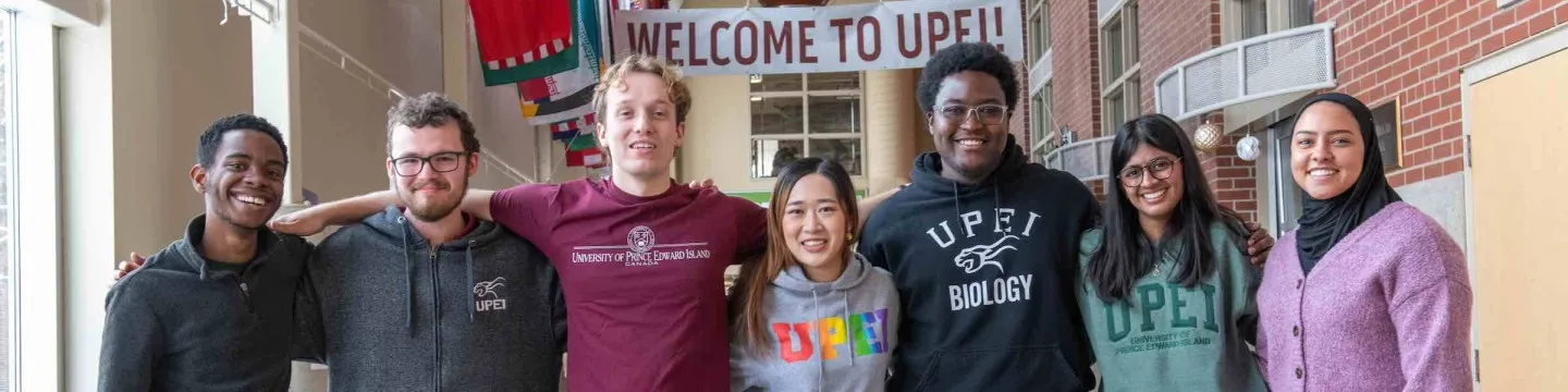 seven students in the breezeway of the W.A. Murphy Student Centre