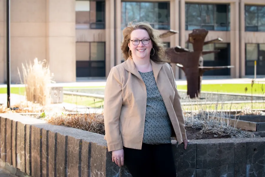 lisa holland standing in front of PEI's government offices 