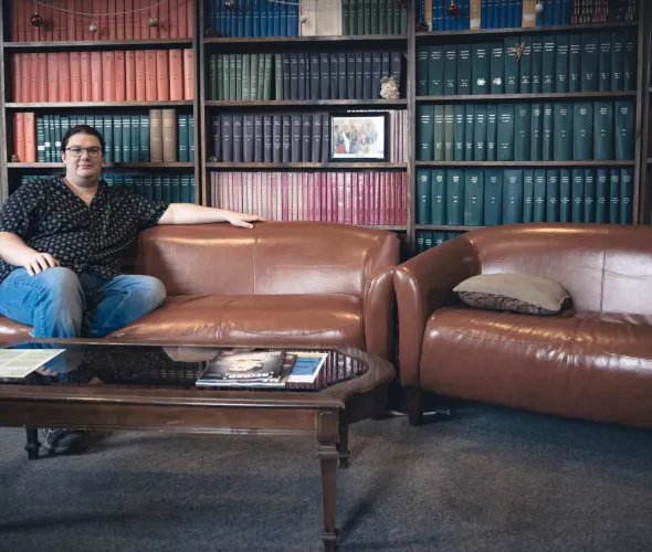 UPEI History student Riley Drake in the History student lounge