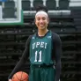 UPEI student and basketball guard Lauren Rainford holding a basketball